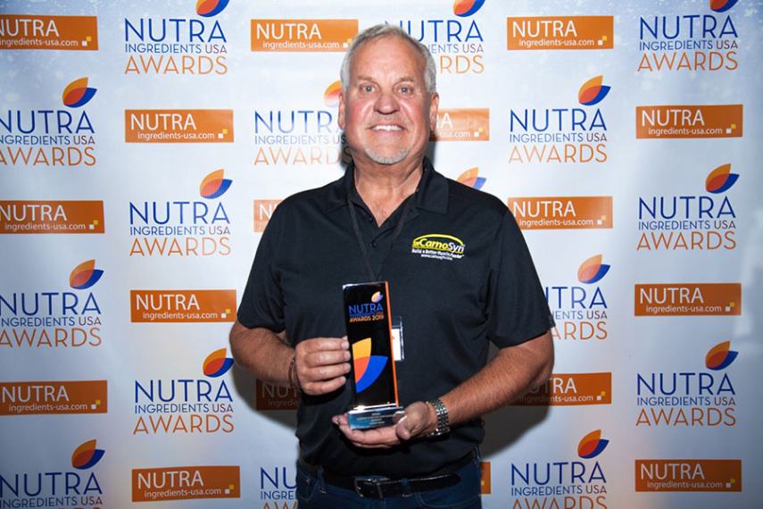 Mark LeDoux, NAI CEO & Chairman, proudly accepts CarnoSyn®’s Sports Nutrition Ingredient of the Year award.