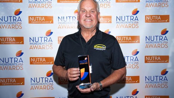 Mark LeDoux, NAI CEO & Chairman, proudly accepts CarnoSyn®’s Sports Nutrition Ingredient of the Year award.