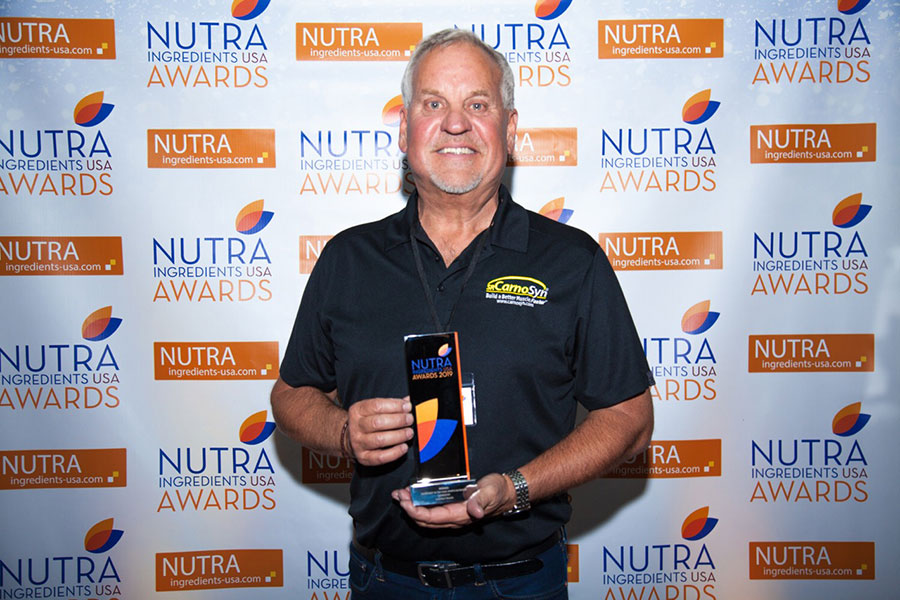 Mark LeDoux, NAI CEO & Chairman, proudly accepts CarnoSyn®’s Sports Nutrition Ingredient of the Year award.